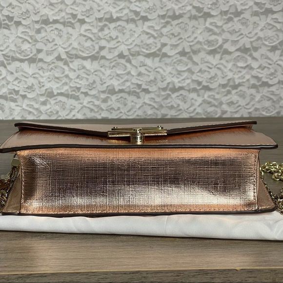 MICHAEL Michael Kors
Medium Grace Metallic Rose Gold Leather Envelope Cl… - Picture 9 of 11